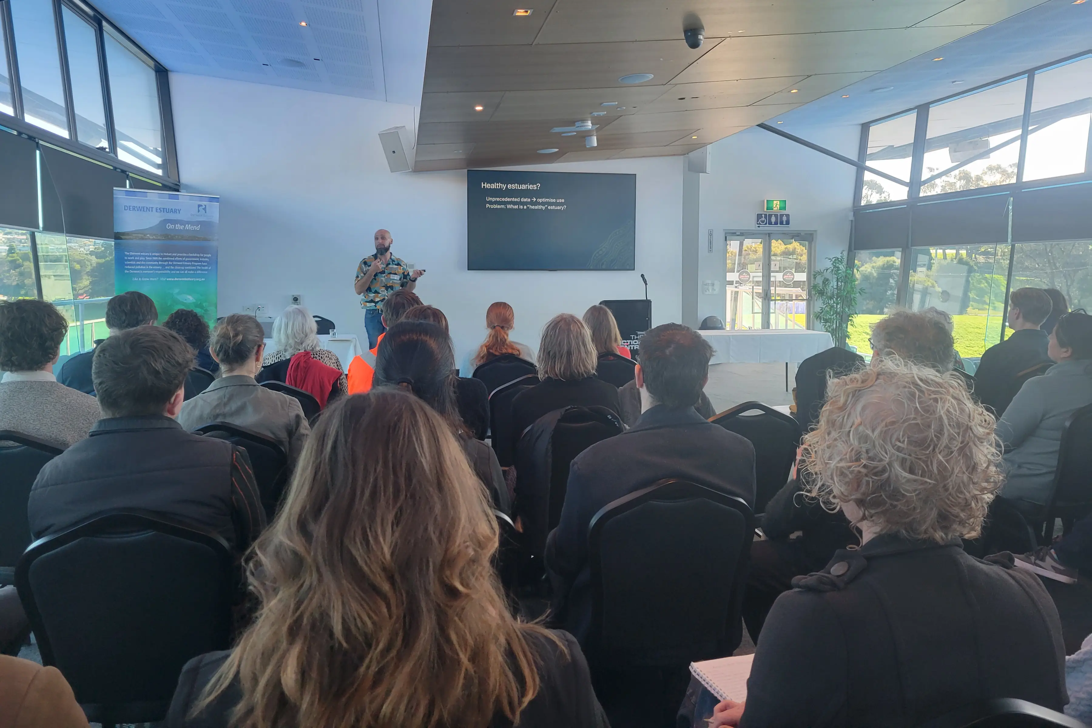 Dr Maarten de Brauwer presenting at the symposium. Photo: Chiara Danse.