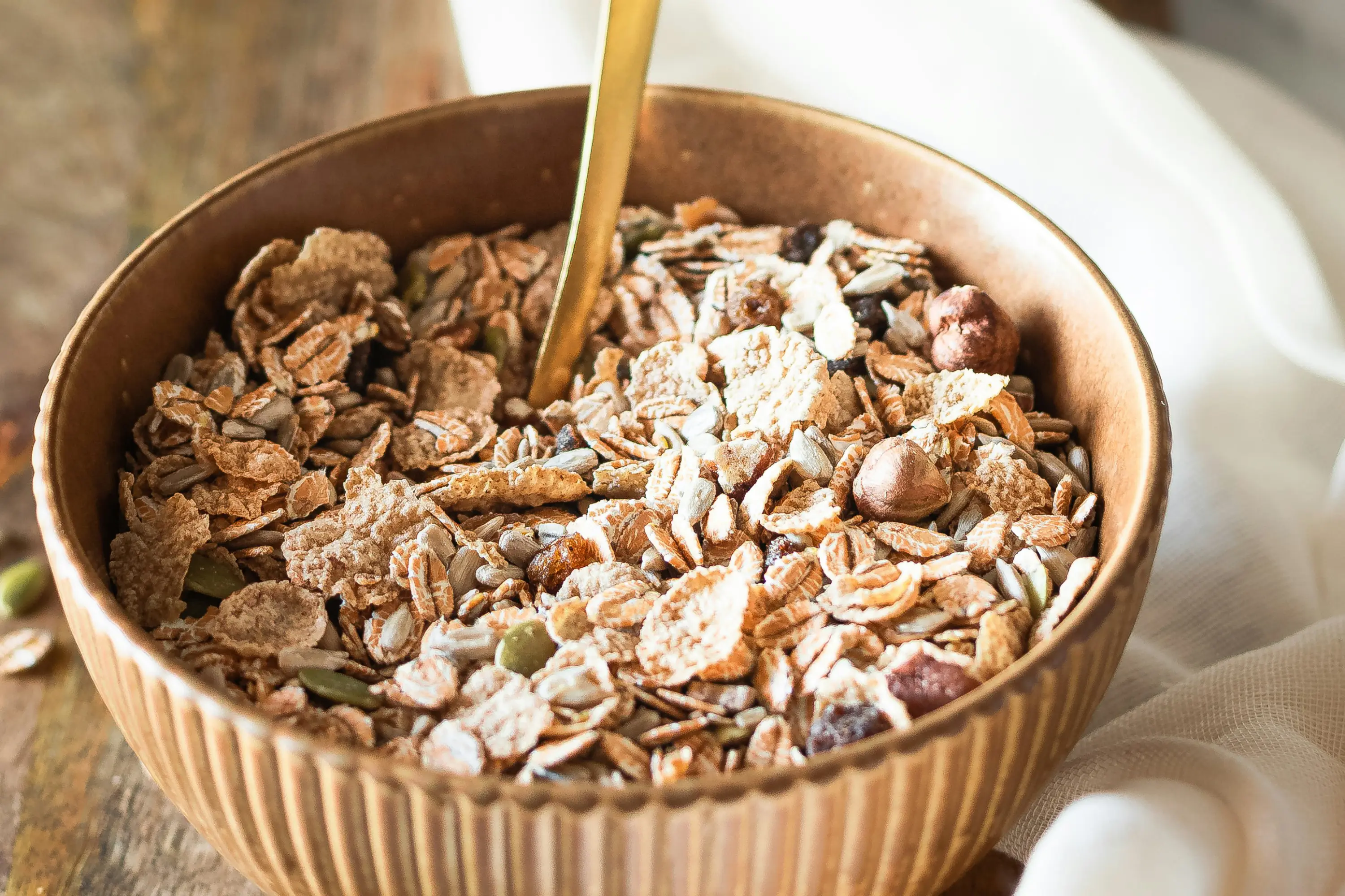 Caramalised buckies can be added to muesli for added crunch. Photo: Micheile Henderson / Unsplash.
