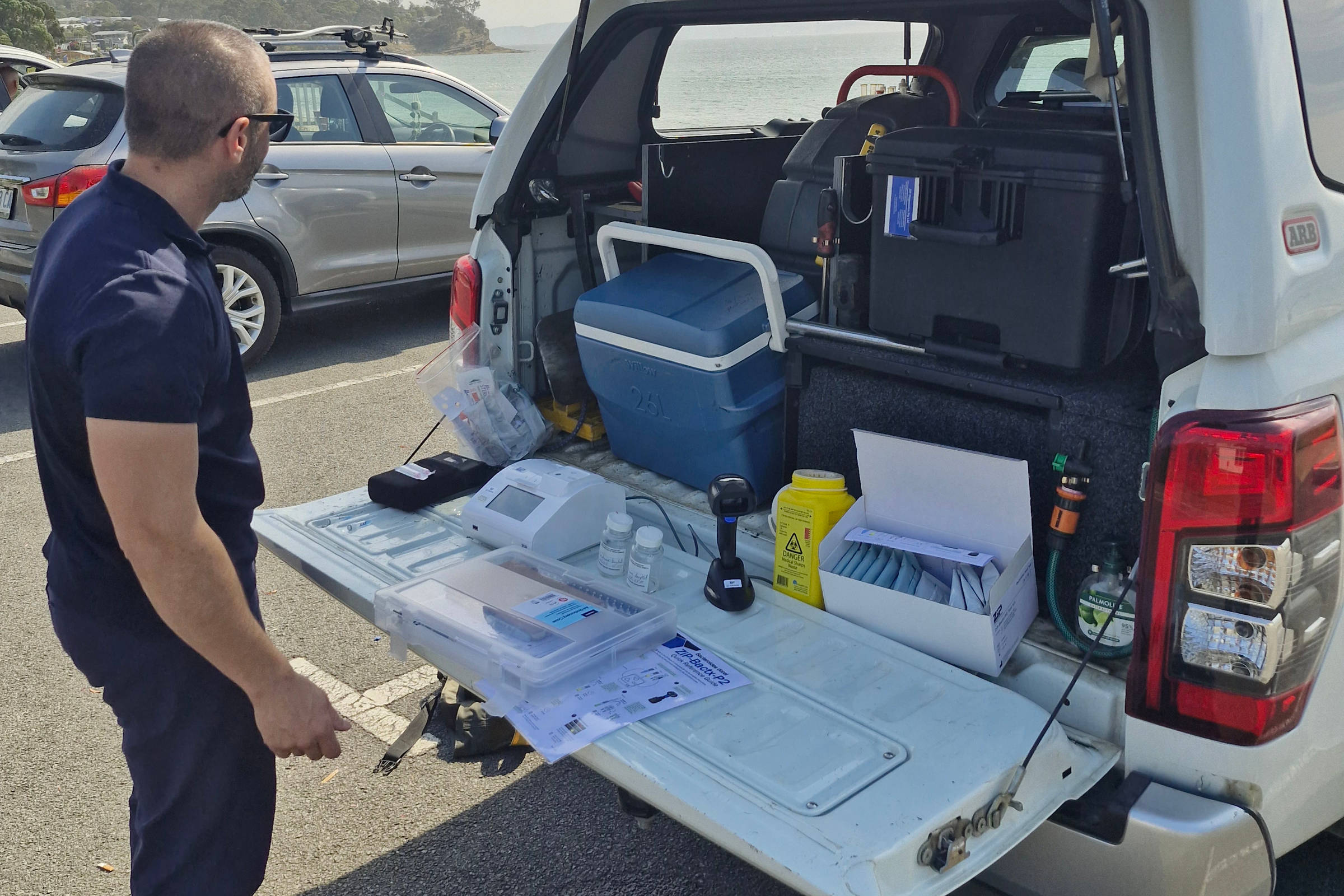 Testing beach water quality in Kingborough. Photo: Derwent Estuary Program.