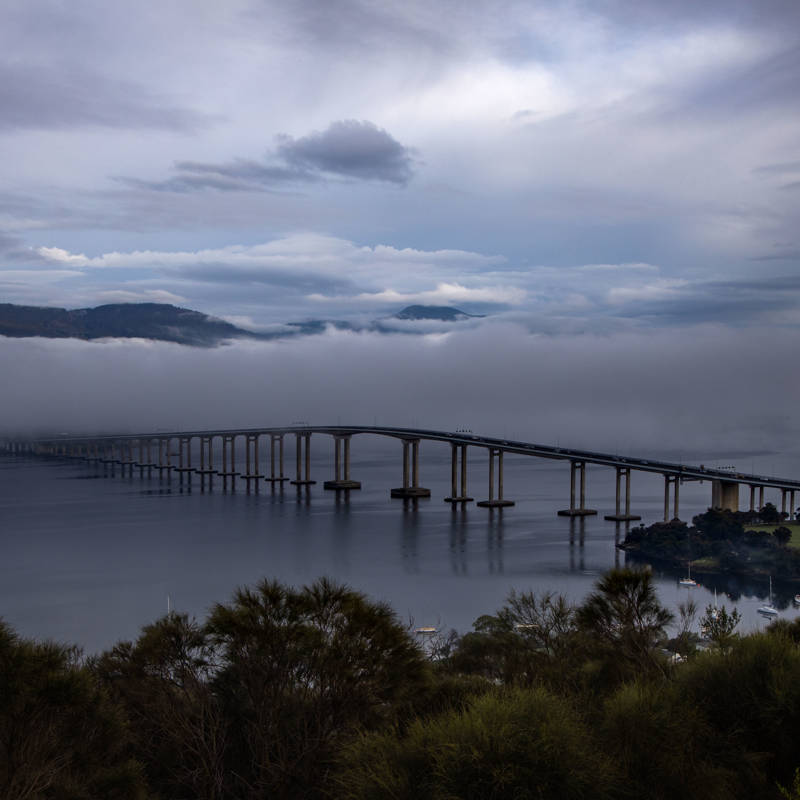 A cold dawn brings the icy flow of fog down the River Derwent, Hobart. Image: Tim Rudman.