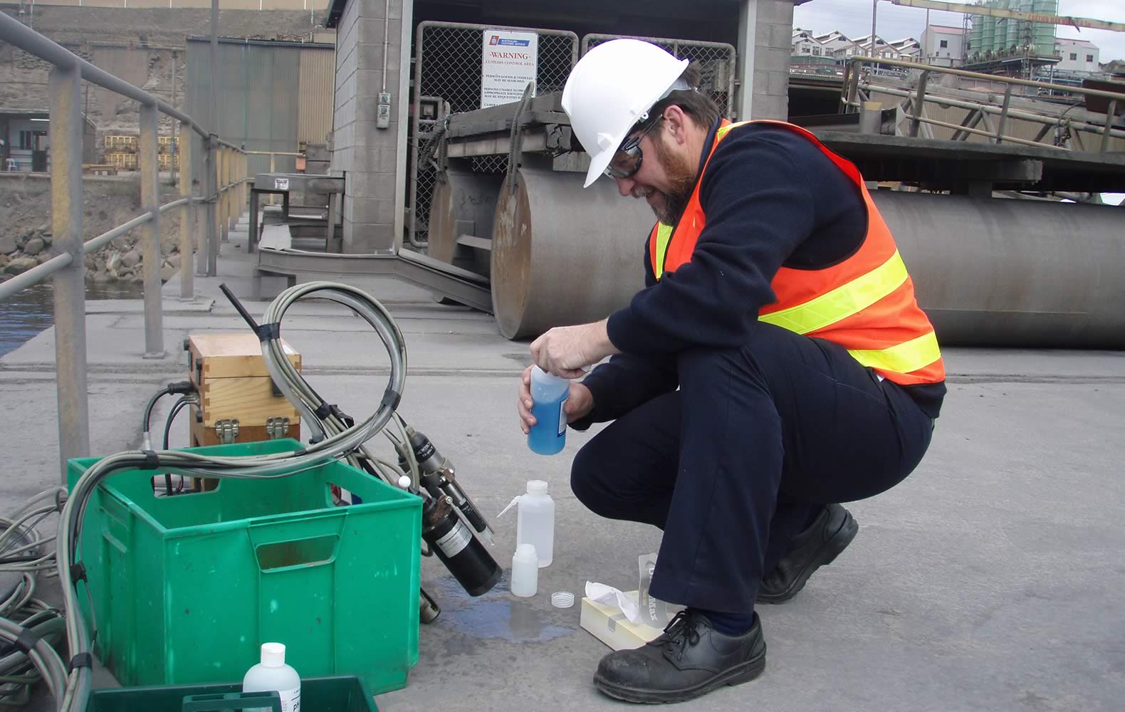 Calibrating monitoring equipment. Photo: Derwent Estuary Program.