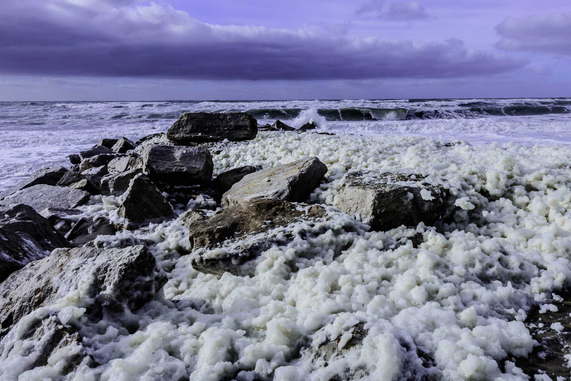 Storms stir up sea foam on Australia's coast